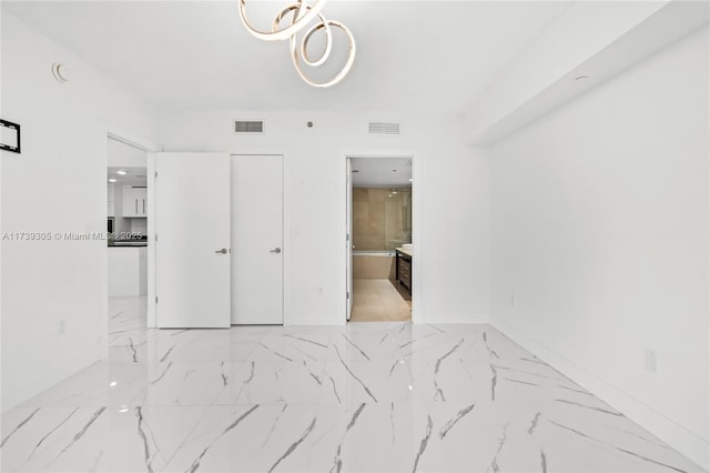 bedroom featuring connected bathroom