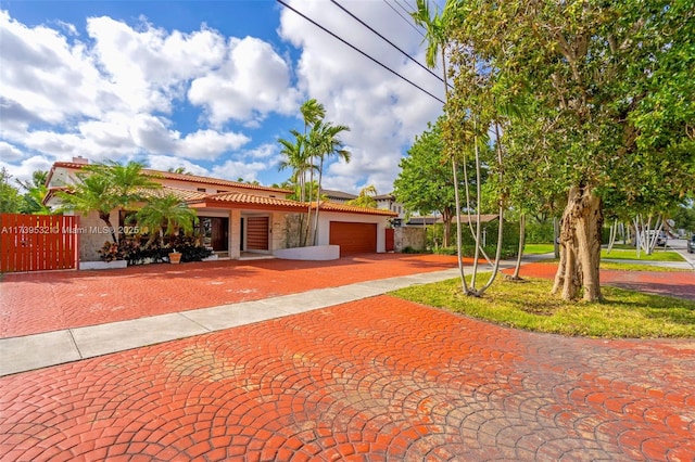 view of front of home with a garage