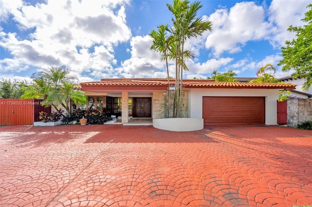 view of front of property with a garage