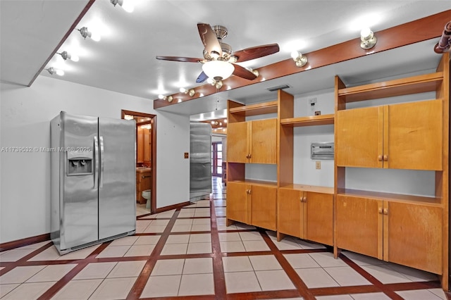 kitchen featuring ceiling fan, stainless steel fridge with ice dispenser, and light tile patterned floors