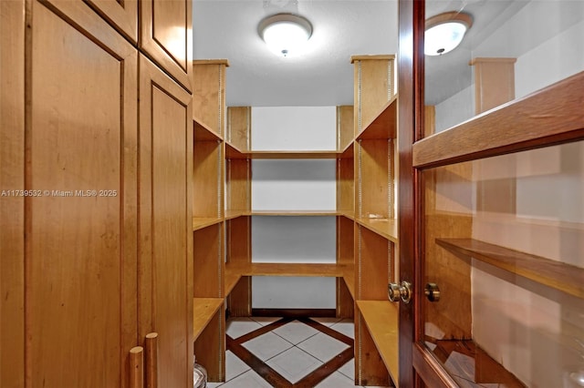 interior space with light tile patterned floors