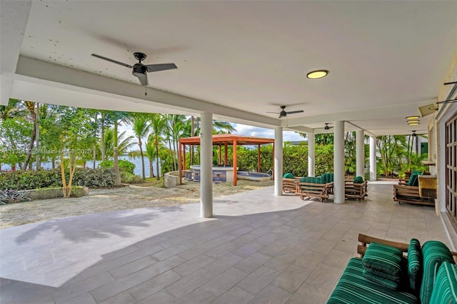 view of patio / terrace with a gazebo, an outdoor hangout area, and ceiling fan