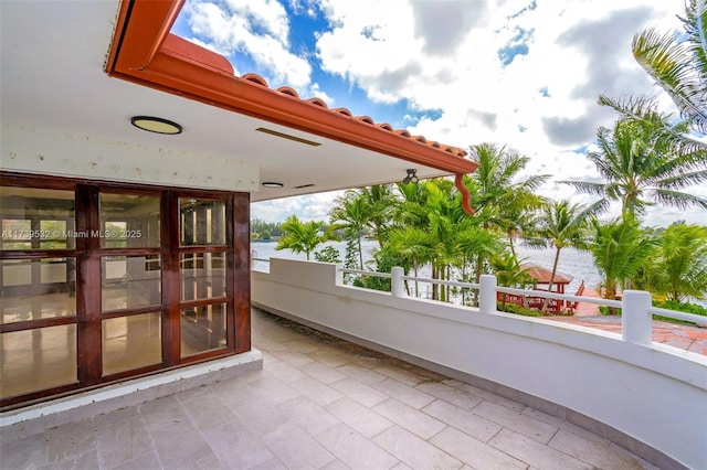 view of patio / terrace featuring a water view