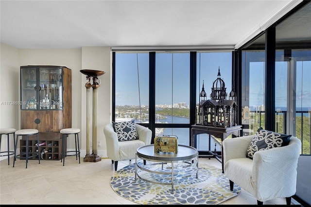 interior space featuring floor to ceiling windows and baseboards