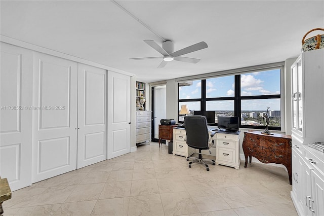 936 Intracoastal Dr Unit 21A, Fort Lauderdale, FL 33304 - office area with marble finish floor and ceiling fan