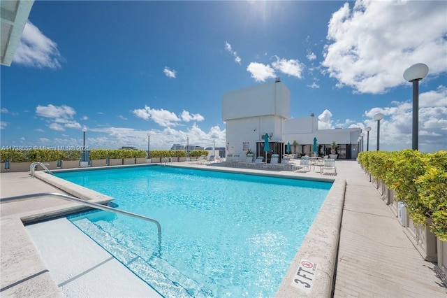 community pool featuring a patio