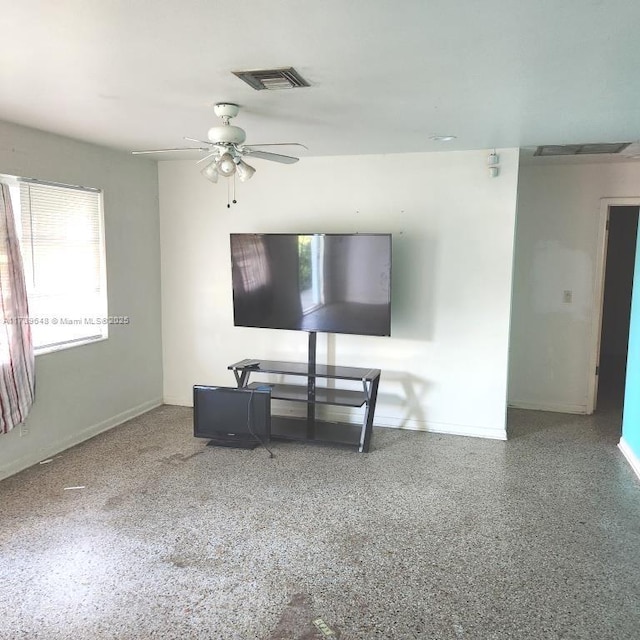 living room featuring ceiling fan