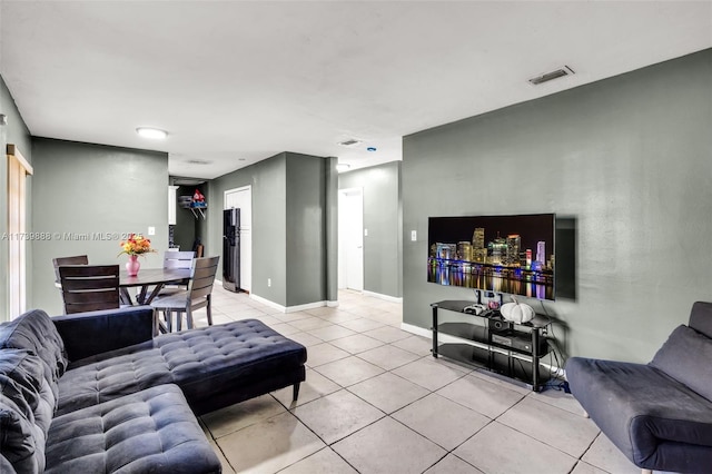 living room featuring light tile patterned floors