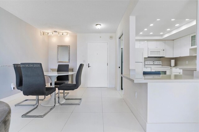 view of tiled dining area