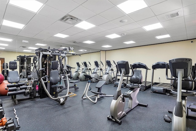 workout area with a drop ceiling