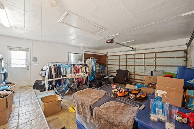 garage featuring a garage door opener