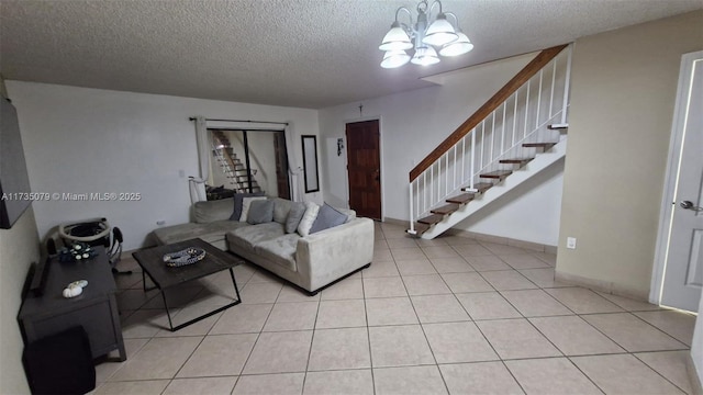 living room featuring an inviting chandelier, light tile patterned floors, and a textured ceiling