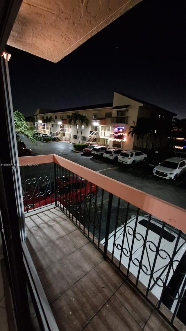 view of balcony at night