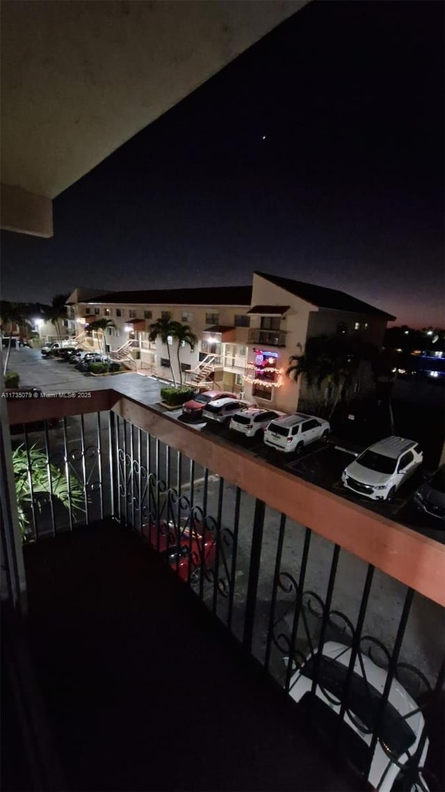 view of balcony at night