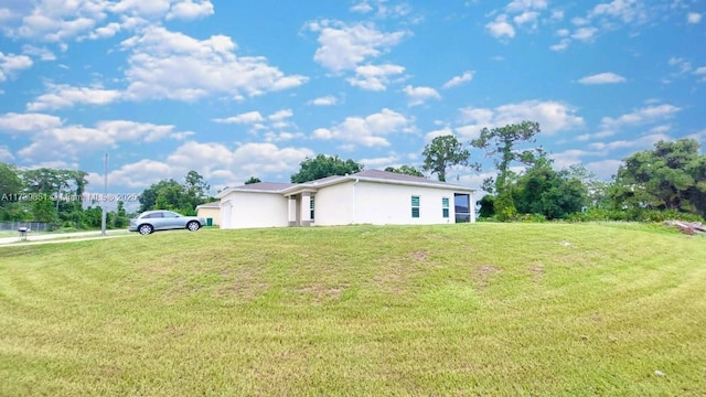 view of yard with a garage