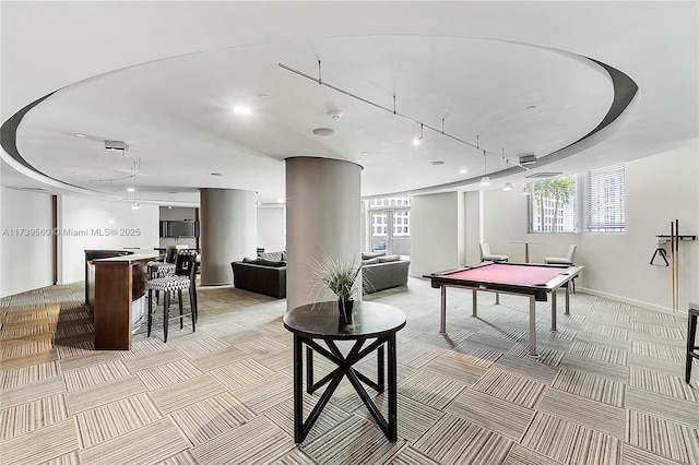 playroom featuring pool table, baseboards, a wealth of natural light, and light colored carpet