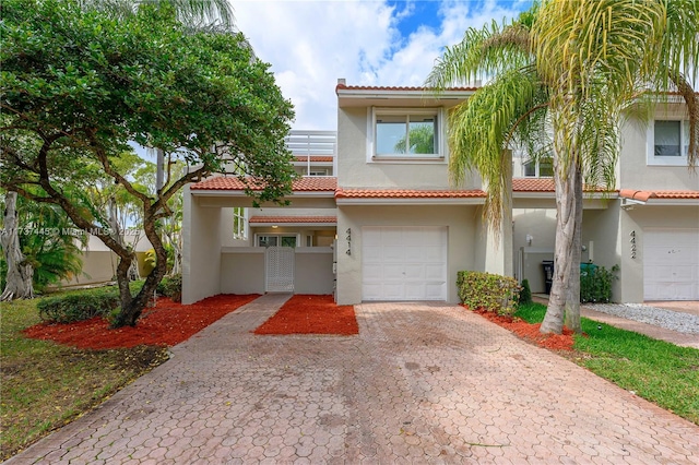 view of front of property with a garage