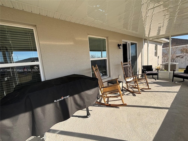 view of patio featuring cooling unit