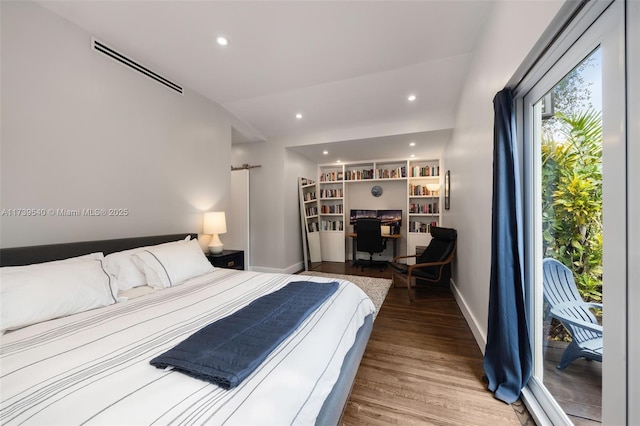 bedroom with wood-type flooring, access to exterior, and vaulted ceiling