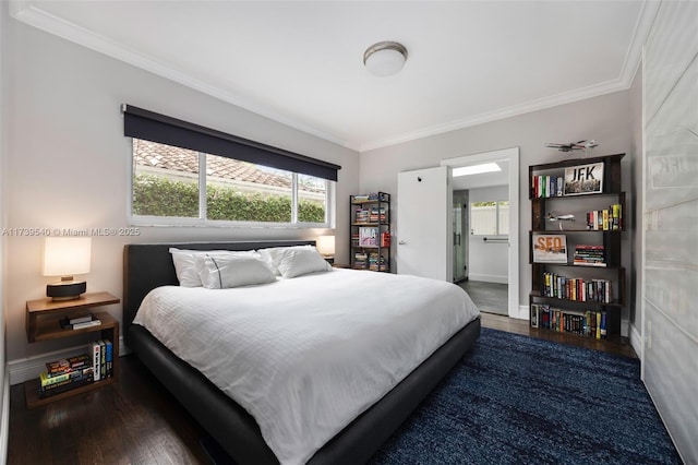 bedroom with crown molding and dark wood-type flooring