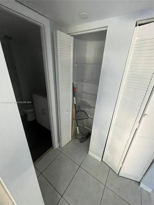 bathroom featuring tile patterned flooring