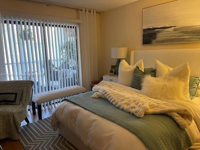 bedroom featuring wood-type flooring