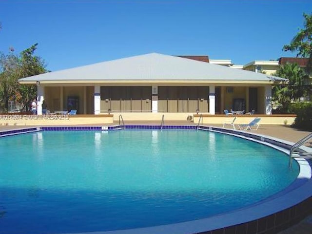 view of pool featuring a patio