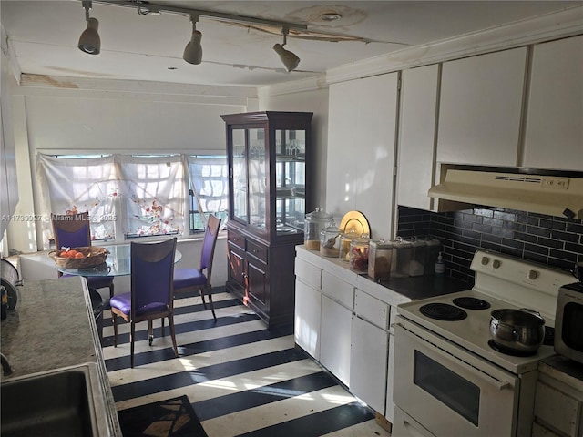 kitchen featuring white cabinetry, white electric range, and decorative backsplash