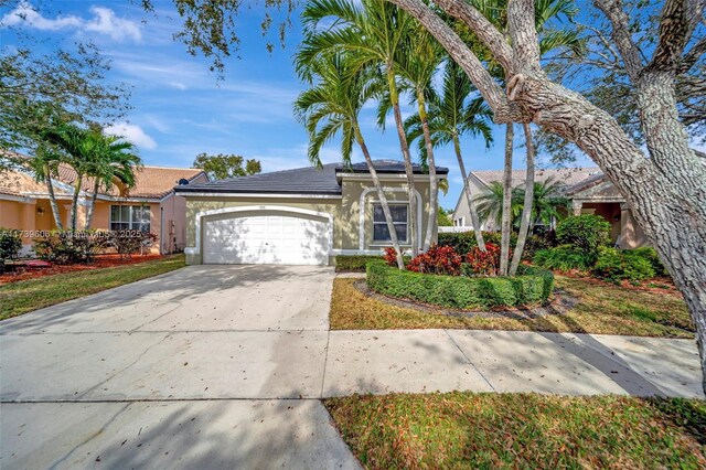 view of front of home with a garage