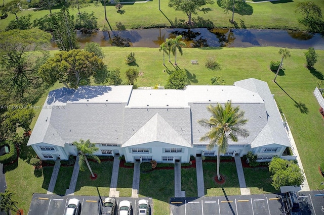 drone / aerial view with a water view