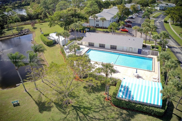 birds eye view of property featuring a water view