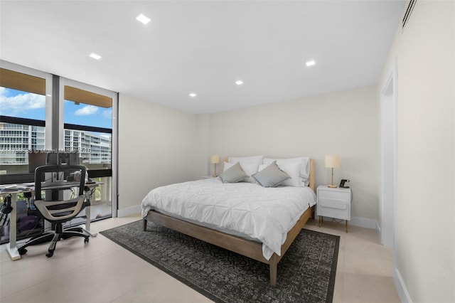 bedroom with a wall of windows