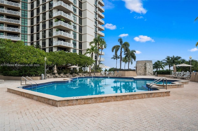 view of pool featuring a gazebo and a patio