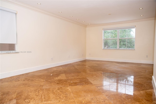 spare room with ornamental molding