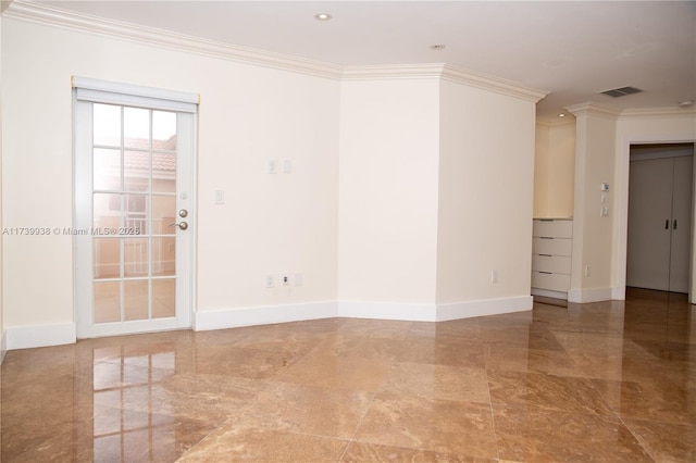 spare room with crown molding