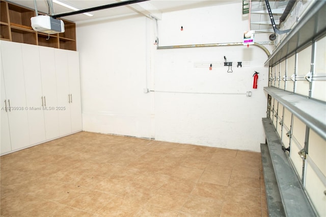 garage featuring a garage door opener