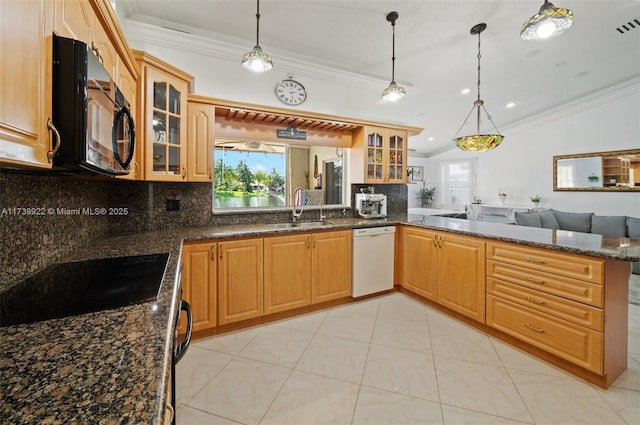 kitchen featuring sink, decorative light fixtures, crown molding, black appliances, and kitchen peninsula