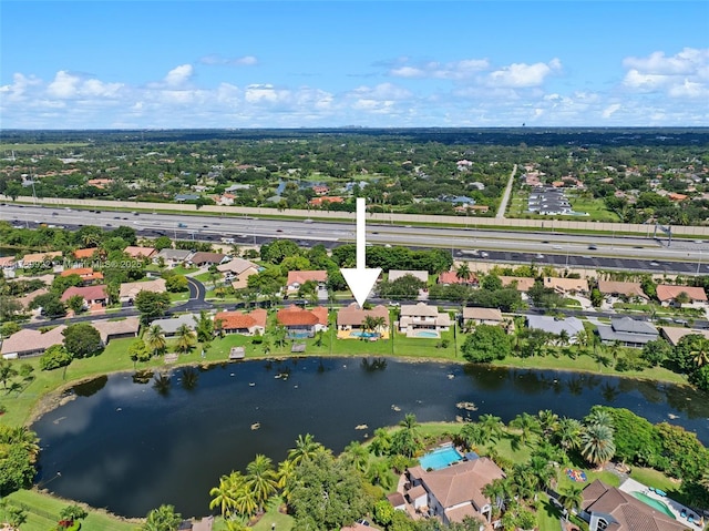 bird's eye view with a water view