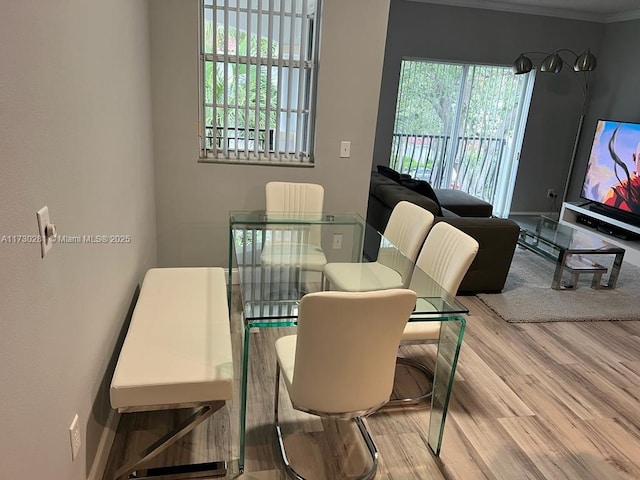 dining space featuring hardwood / wood-style flooring