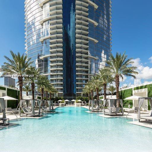 view of pool featuring a patio