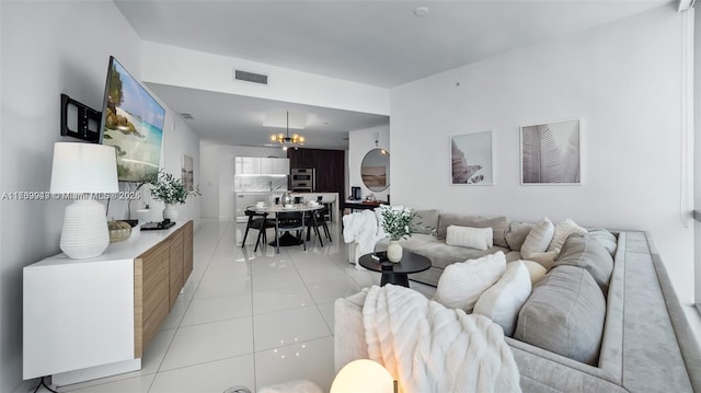 851 NE 1st Ave Unit 3303, Miami, FL 33132 - living room with light tile patterned flooring and an inviting chandelier