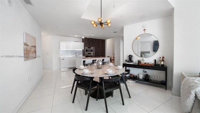 851 NE 1st Ave Unit 3303, Miami, FL 33132 - dining room featuring an inviting chandelier and light tile patterned floors