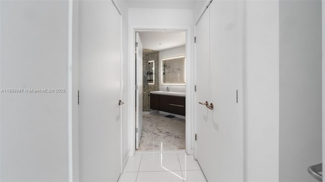 851 NE 1st Ave Unit 3303, Miami, FL 33132 - hall with light tile patterned floors and sink