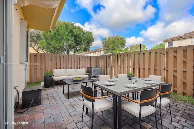 view of patio with an outdoor living space