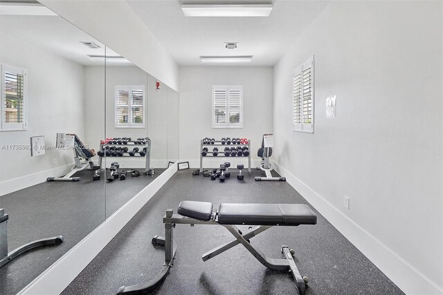 exercise room featuring a healthy amount of sunlight