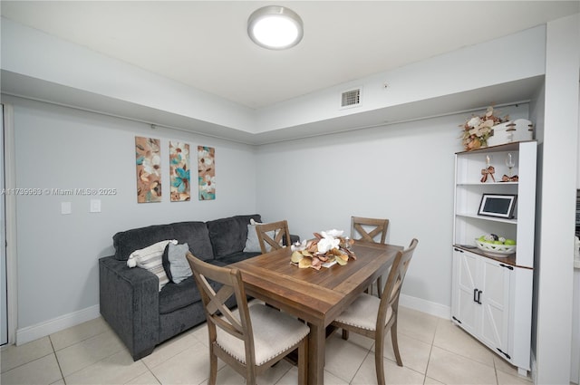 view of tiled dining space