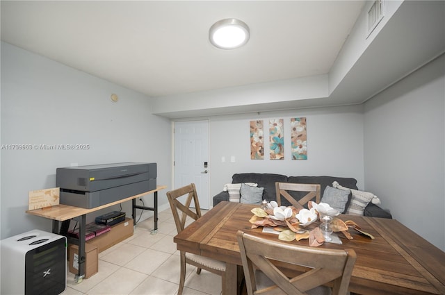 dining room featuring light tile patterned floors