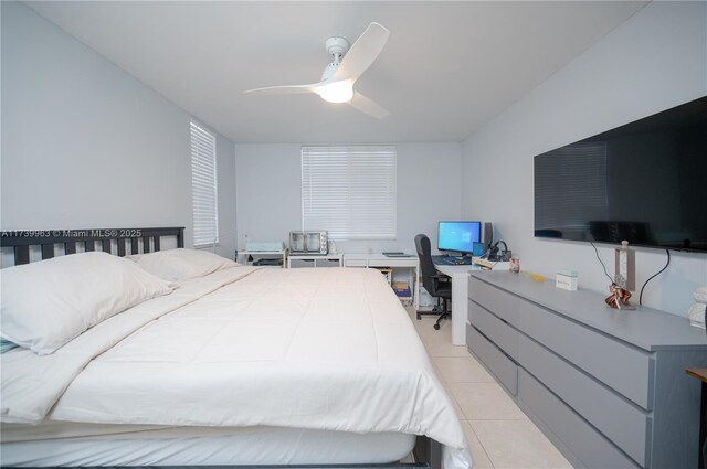 bedroom with light tile patterned floors and ceiling fan