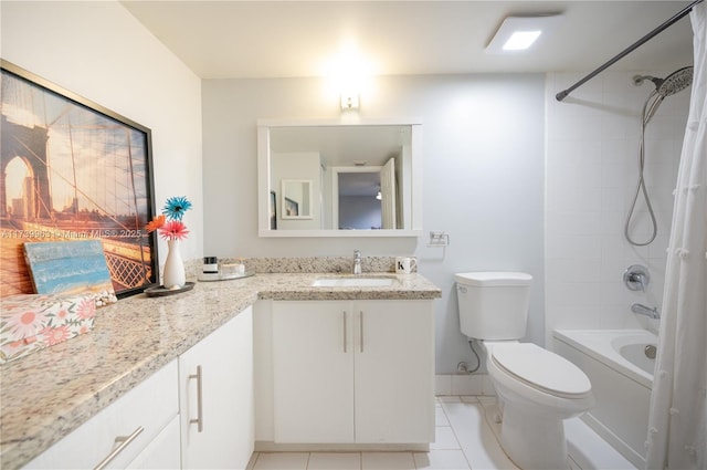 full bathroom with tiled shower / bath combo, vanity, tile patterned flooring, and toilet