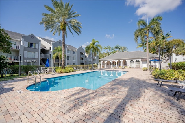 view of swimming pool featuring a patio